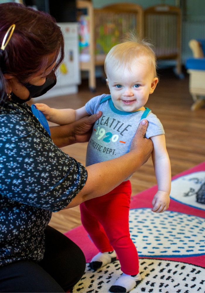 Provider holding baby