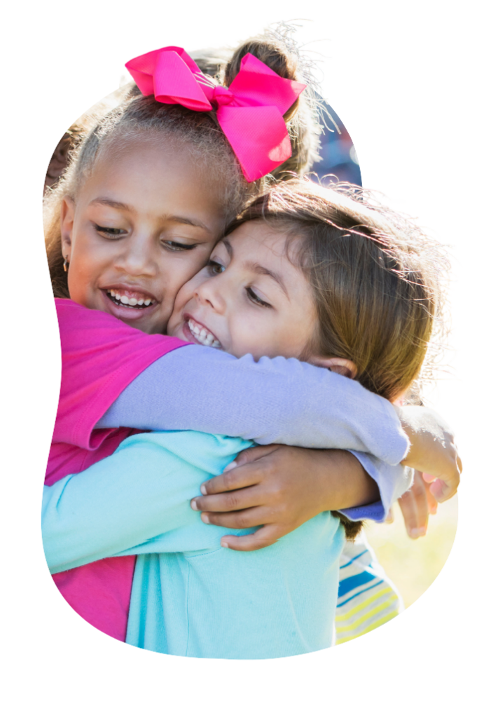 Two children embracing