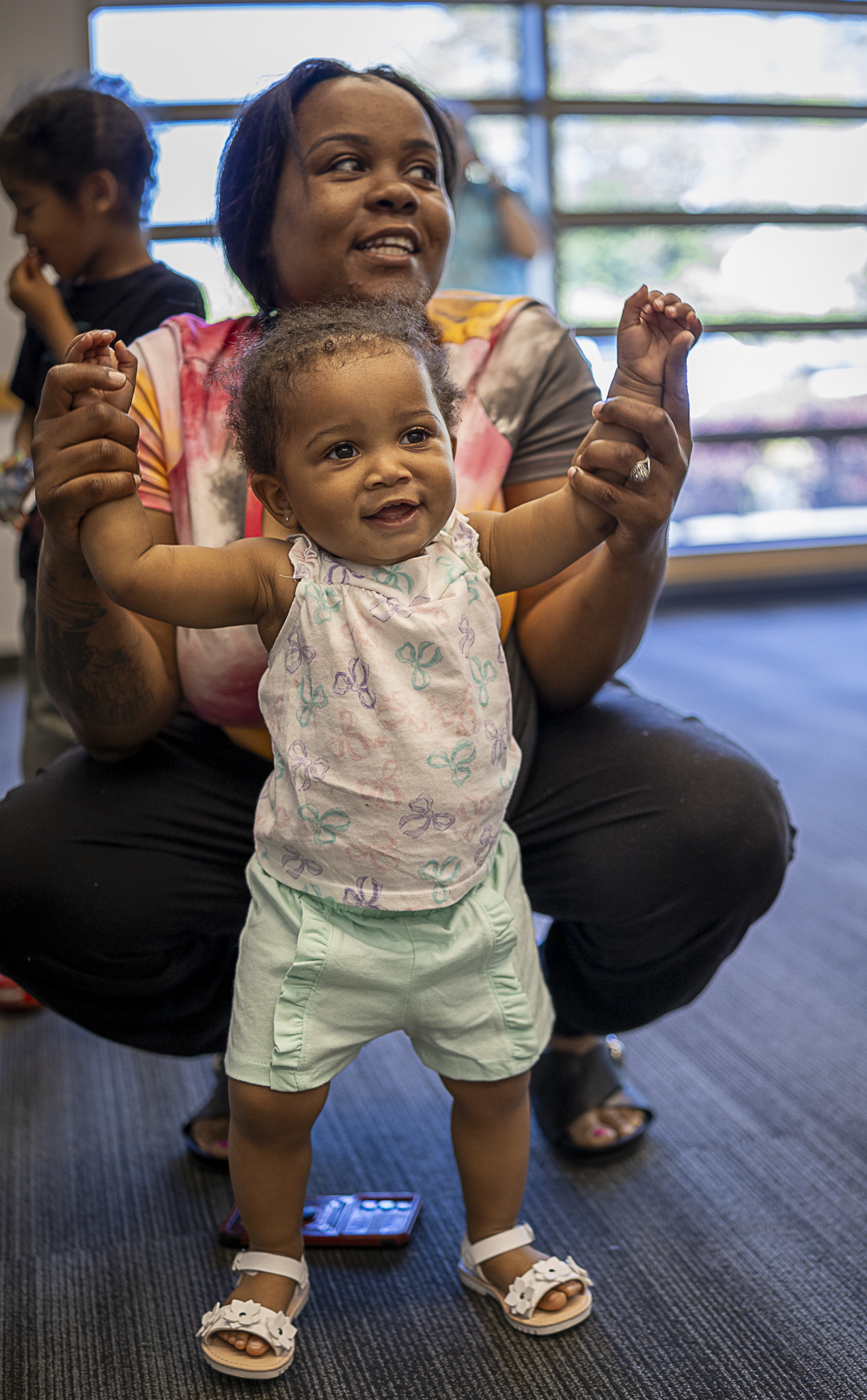 parent poses with child